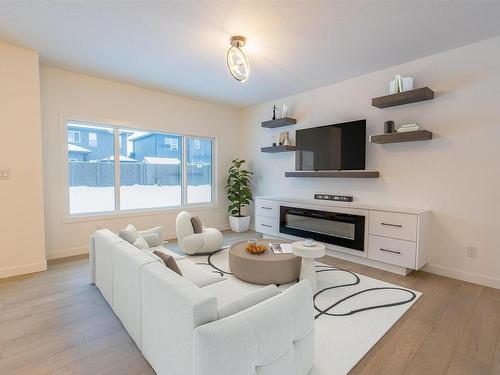 69 Penn Place, Spruce Grove, AB - Indoor Photo Showing Living Room With Fireplace