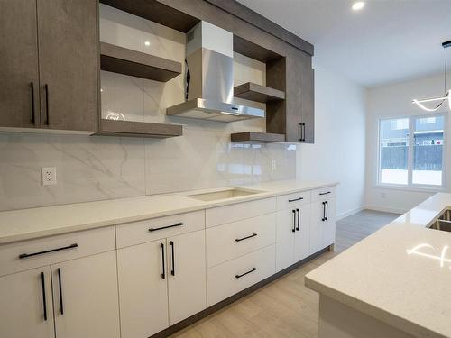 69 Penn Place, Spruce Grove, AB - Indoor Photo Showing Kitchen With Double Sink