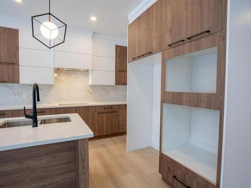 71 Penn Place, Spruce Grove, AB - Indoor Photo Showing Kitchen With Double Sink