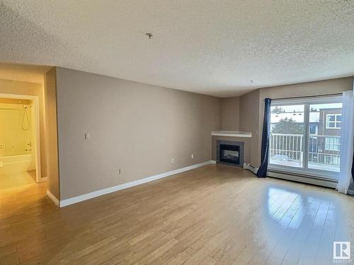 205 11446 40 Avenue, Edmonton, AB - Indoor With Fireplace