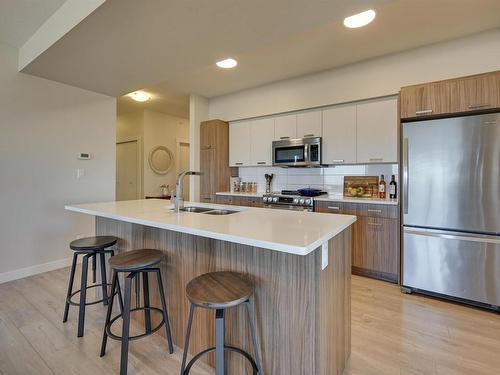 2703 10410 102 Avenue, Edmonton, AB - Indoor Photo Showing Kitchen With Stainless Steel Kitchen With Double Sink