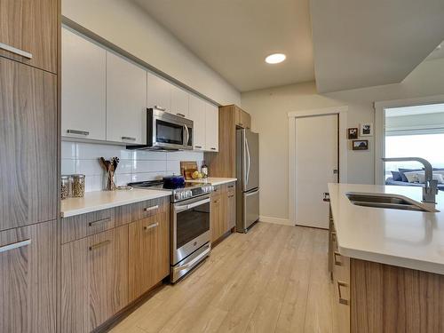 2703 10410 102 Avenue, Edmonton, AB - Indoor Photo Showing Kitchen With Stainless Steel Kitchen With Double Sink