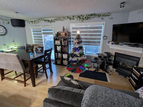 1 4350 23 Street Nw, Edmonton, AB - Indoor With Fireplace