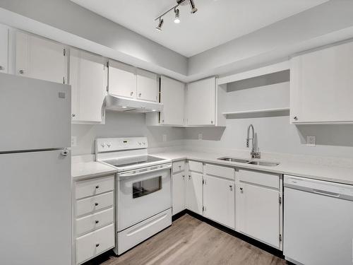 101 7403 171 Street, Edmonton, AB - Indoor Photo Showing Kitchen With Double Sink