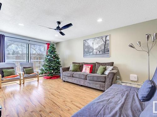 304 10635 80 Avenue, Edmonton, AB - Indoor Photo Showing Living Room