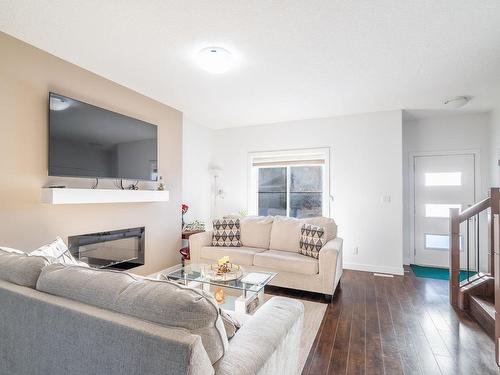 9201 Cooper Crescent, Edmonton, AB - Indoor Photo Showing Living Room With Fireplace