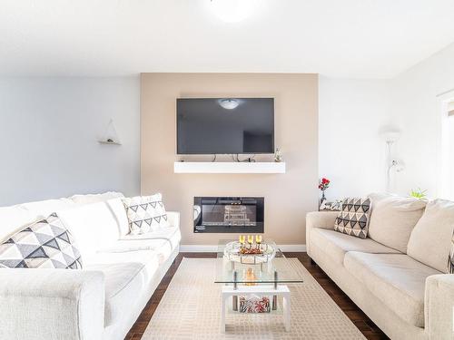 9201 Cooper Crescent, Edmonton, AB - Indoor Photo Showing Living Room With Fireplace