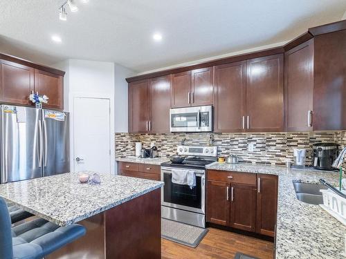 9201 Cooper Crescent, Edmonton, AB - Indoor Photo Showing Kitchen With Double Sink With Upgraded Kitchen