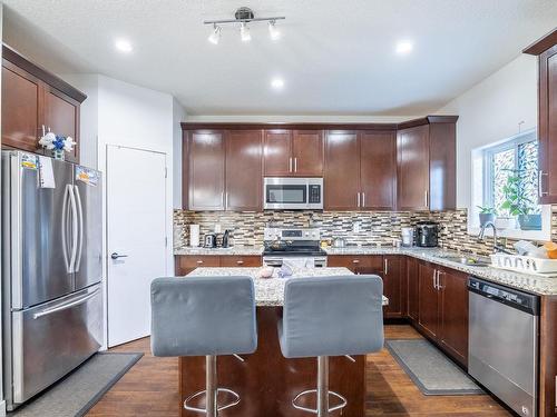 9201 Cooper Crescent, Edmonton, AB - Indoor Photo Showing Kitchen With Upgraded Kitchen