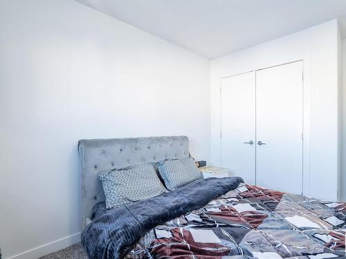 9201 Cooper Crescent, Edmonton, AB - Indoor Photo Showing Bedroom