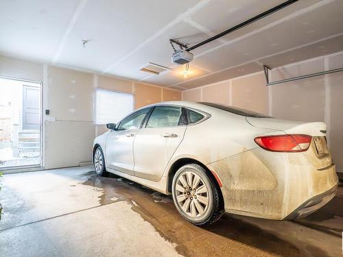 9201 Cooper Crescent, Edmonton, AB - Indoor Photo Showing Garage