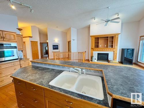 16203 89 Street, Edmonton, AB - Indoor Photo Showing Kitchen With Fireplace With Double Sink