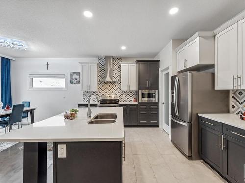 7844 Erasmus Wynd, Edmonton, AB - Indoor Photo Showing Kitchen With Double Sink With Upgraded Kitchen