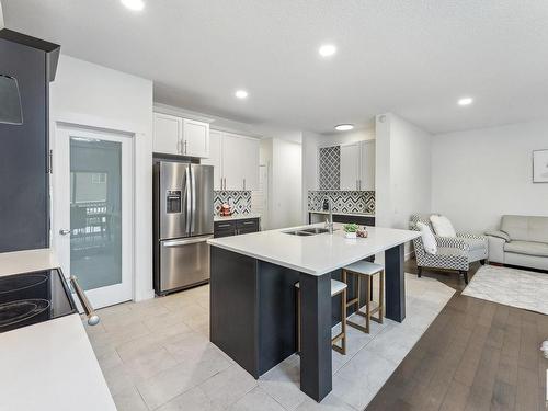 7844 Erasmus Wynd, Edmonton, AB - Indoor Photo Showing Kitchen With Double Sink