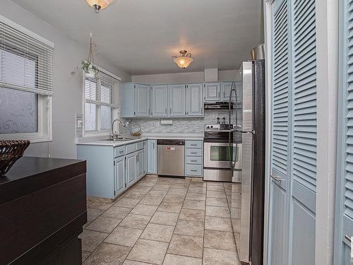 3539 13 Avenue, Edmonton, AB - Indoor Photo Showing Kitchen With Stainless Steel Kitchen