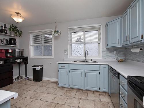 3539 13 Avenue, Edmonton, AB - Indoor Photo Showing Kitchen With Double Sink