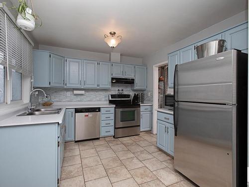 3539 13 Avenue, Edmonton, AB - Indoor Photo Showing Kitchen With Stainless Steel Kitchen With Double Sink