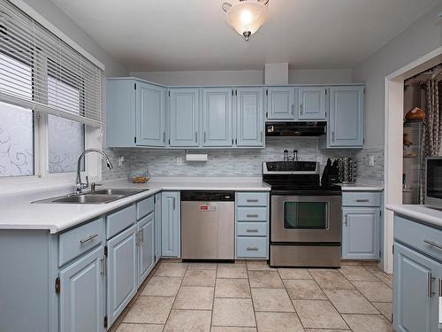 3539 13 Avenue, Edmonton, AB - Indoor Photo Showing Kitchen With Stainless Steel Kitchen With Double Sink