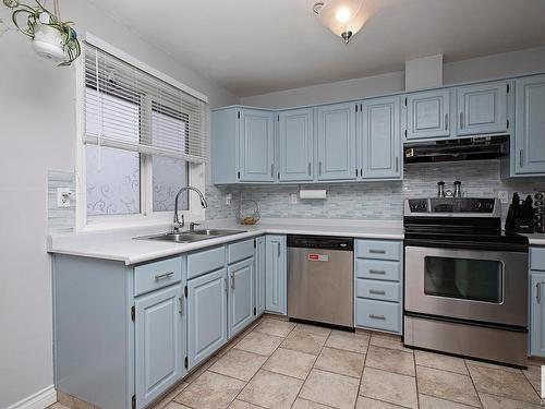 3539 13 Avenue, Edmonton, AB - Indoor Photo Showing Kitchen With Stainless Steel Kitchen With Double Sink