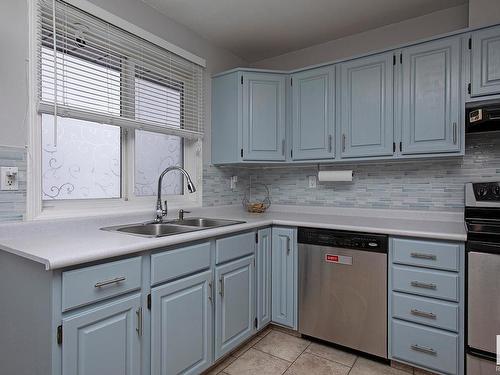 3539 13 Avenue, Edmonton, AB - Indoor Photo Showing Kitchen With Double Sink