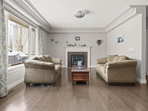 2553 Cameron Ravine Landing Landing, Edmonton, AB - Indoor Photo Showing Living Room With Fireplace