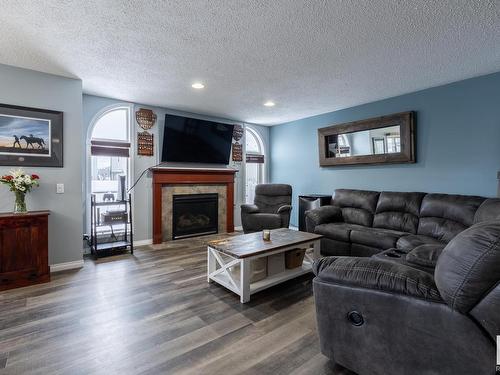 16215 48 Street, Edmonton, AB - Indoor Photo Showing Living Room With Fireplace