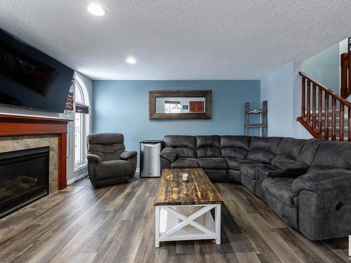 16215 48 Street, Edmonton, AB - Indoor Photo Showing Living Room With Fireplace