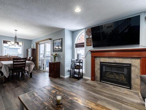 16215 48 Street, Edmonton, AB - Indoor Photo Showing Living Room With Fireplace