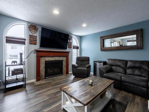 16215 48 Street, Edmonton, AB - Indoor Photo Showing Living Room With Fireplace