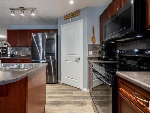 16215 48 Street, Edmonton, AB - Indoor Photo Showing Kitchen With Double Sink