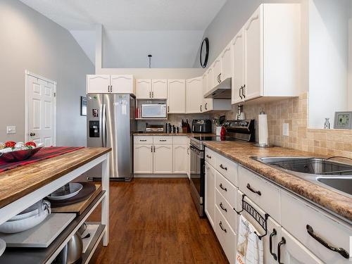 5410 42 Avenue, Beaumont, AB - Indoor Photo Showing Kitchen With Double Sink