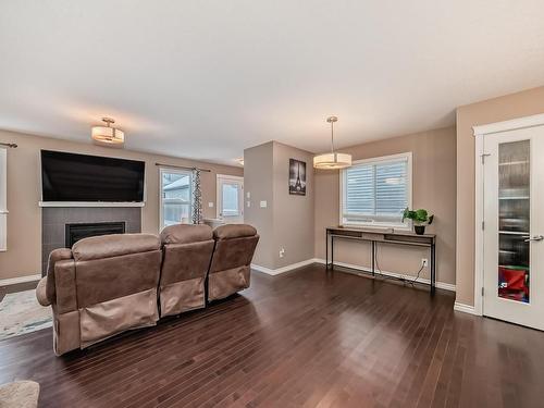 1719 56 Street, Edmonton, AB - Indoor Photo Showing Living Room With Fireplace