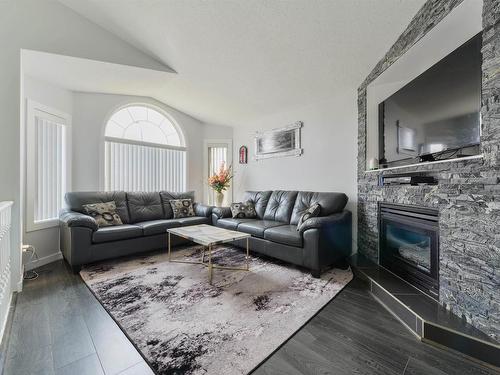 417 Hollick-Kenyon Road, Edmonton, AB - Indoor Photo Showing Living Room With Fireplace