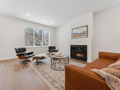 114 Heron Point Close, Rural Wetaskiwin County, AB - Indoor Photo Showing Living Room With Fireplace