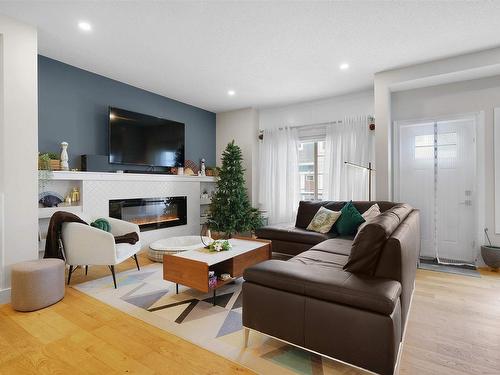 20 230 Edgemont Road, Edmonton, AB - Indoor Photo Showing Living Room With Fireplace