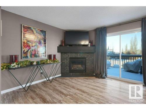 84 Austin Crest, Spruce Grove, AB - Indoor Photo Showing Living Room With Fireplace