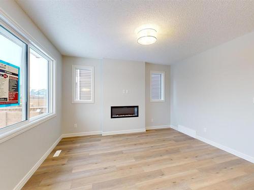 1713 Westerra Wynd, Stony Plain, AB - Indoor With Fireplace