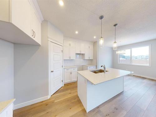 1713 Westerra Wynd, Stony Plain, AB - Indoor Photo Showing Kitchen With Double Sink