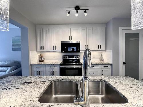 6638 Cardinal Road, Edmonton, AB - Indoor Photo Showing Kitchen With Double Sink