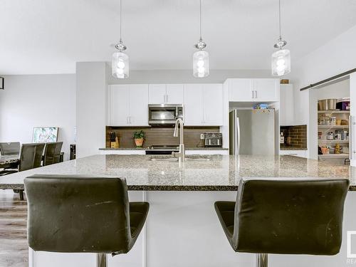 20722 99A Avenue, Edmonton, AB - Indoor Photo Showing Kitchen With Stainless Steel Kitchen With Double Sink With Upgraded Kitchen