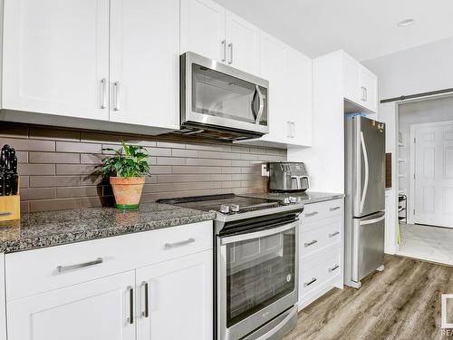 20722 99A Avenue, Edmonton, AB - Indoor Photo Showing Kitchen With Stainless Steel Kitchen With Upgraded Kitchen