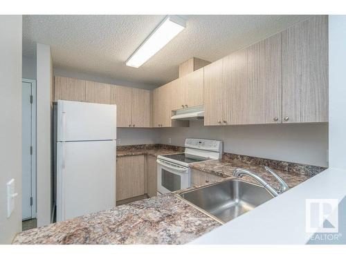 403 14808 26 Street, Edmonton, AB - Indoor Photo Showing Kitchen With Double Sink