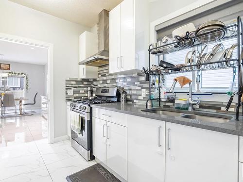 3608 46 Avenue, Beaumont, AB - Indoor Photo Showing Kitchen With Double Sink