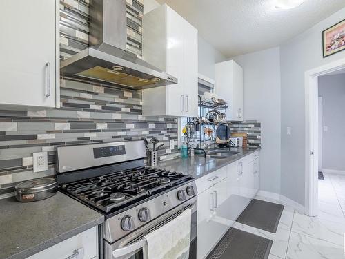 3608 46 Avenue, Beaumont, AB - Indoor Photo Showing Kitchen With Upgraded Kitchen