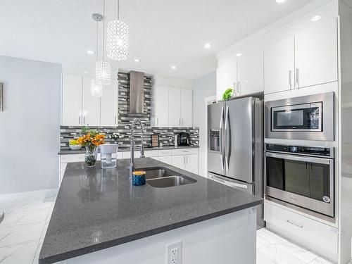 3608 46 Avenue, Beaumont, AB - Indoor Photo Showing Kitchen With Stainless Steel Kitchen With Double Sink With Upgraded Kitchen