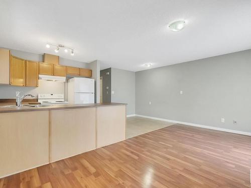 3 130 Hyndman Crescent, Edmonton, AB - Indoor Photo Showing Kitchen With Double Sink