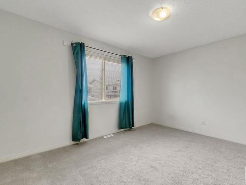 3 130 Hyndman Crescent, Edmonton, AB - Indoor Photo Showing Other Room