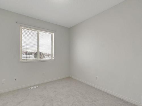 3 130 Hyndman Crescent, Edmonton, AB - Indoor Photo Showing Other Room