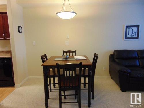 213 8702 Southfort Drive, Fort Saskatchewan, AB - Indoor Photo Showing Dining Room