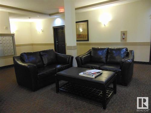 213 8702 Southfort Drive, Fort Saskatchewan, AB - Indoor Photo Showing Living Room